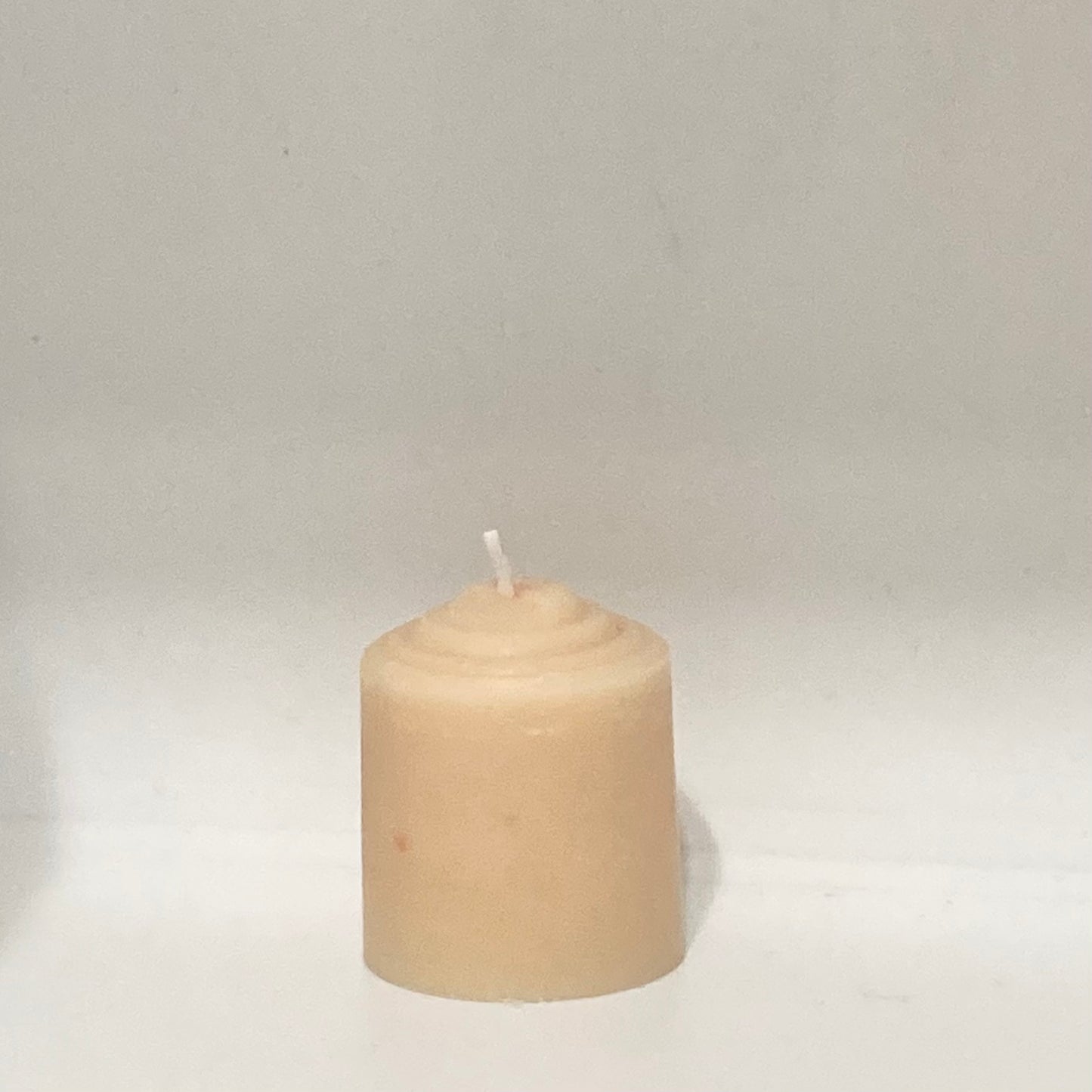 pale yellow votive candle 